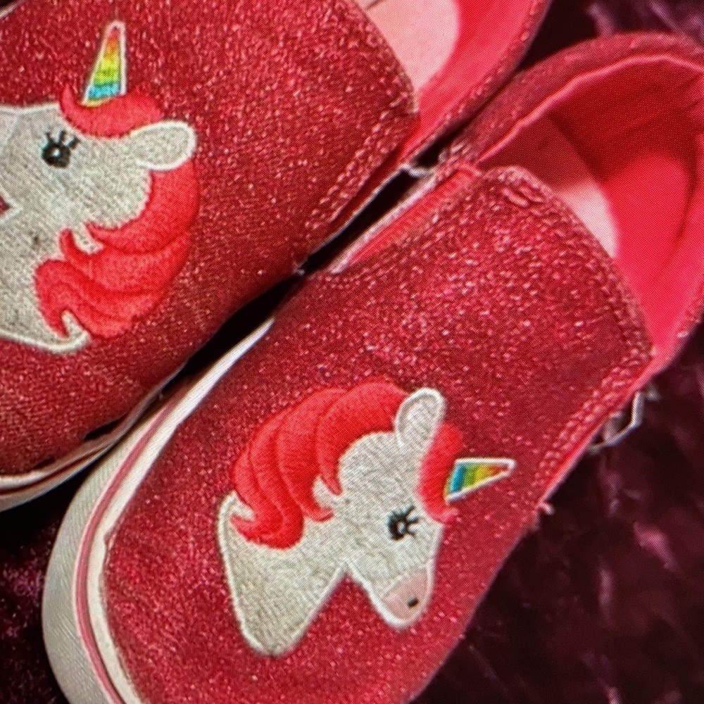 Features vibrant floral print shoes